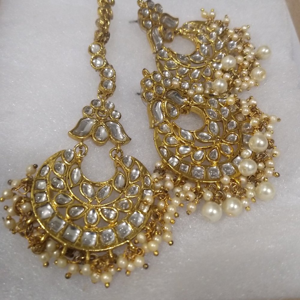 Indian style earrings and mangtikka for forehead
